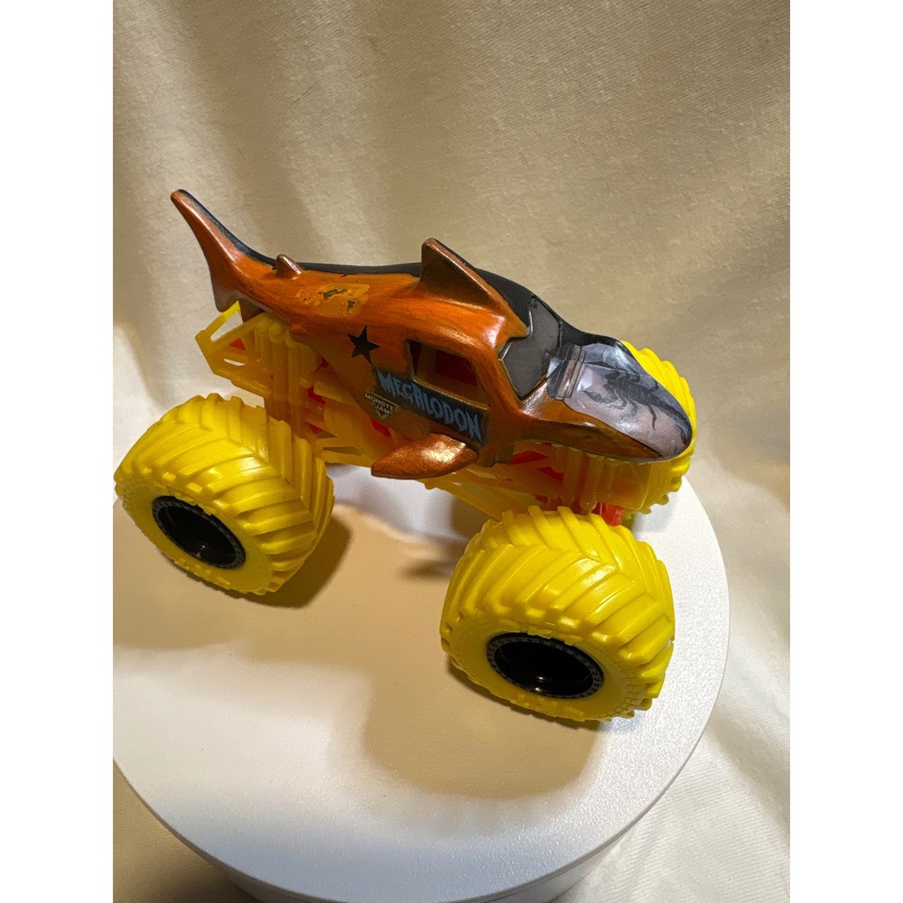 Monster Jam Megalodon Monster Truck Copper Black Split Yellow Wheels 1:64